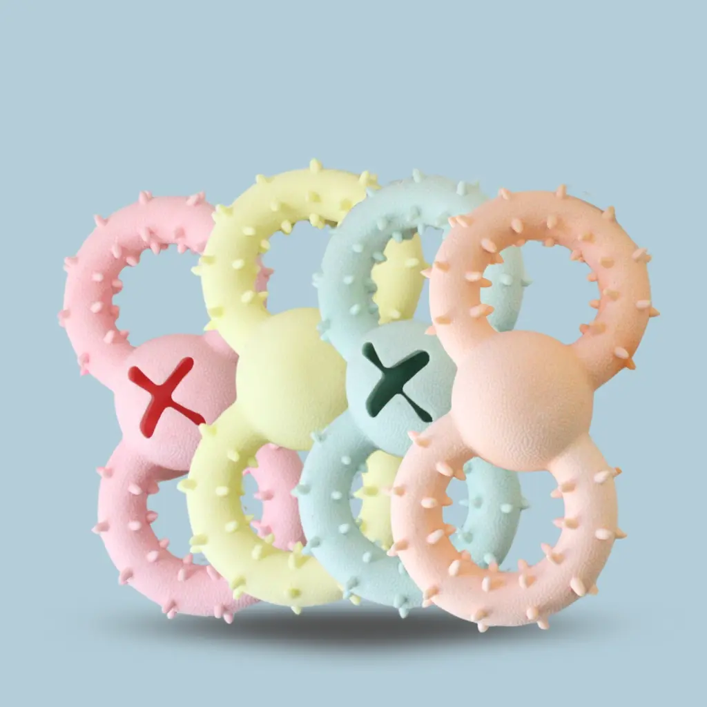 Mordillo 8 con cruz dosificador color pastel